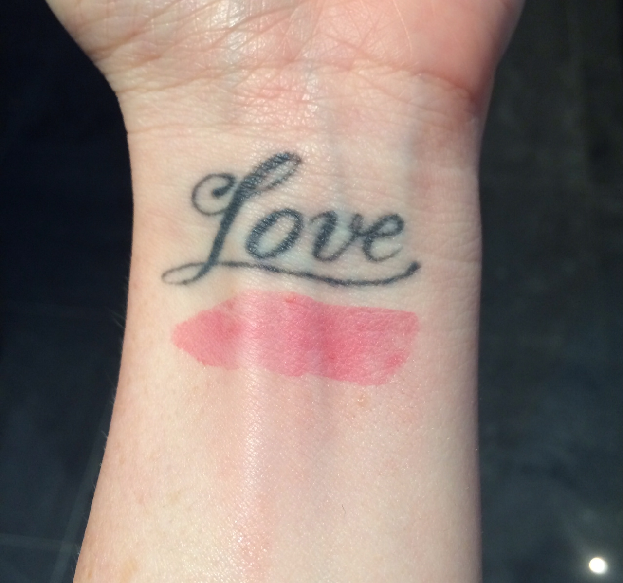The colour stain that is left after wiping it off with a tissue